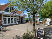 das Bistro ist ca. 200 Meter von der Wohnung entfernt